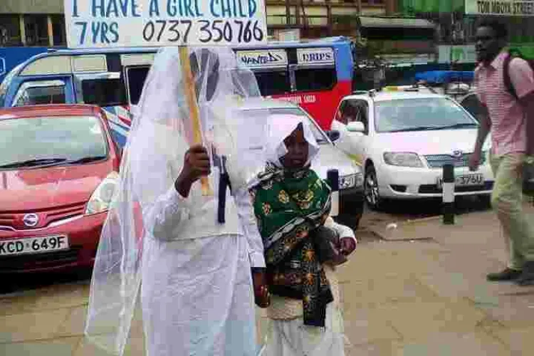 Woman Carries Placard in Streets of Nairobi in Search of Husband 