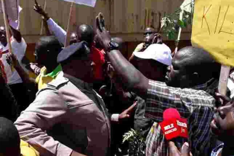 Video of Kenyan Man Caning Anti-Riot Police Officer During Demos Goes Viral Online