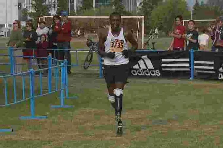 Kenyan-Born Runner who Lost His Legs to Frostbite in US Breaks Amputee Marathon Record in Boston