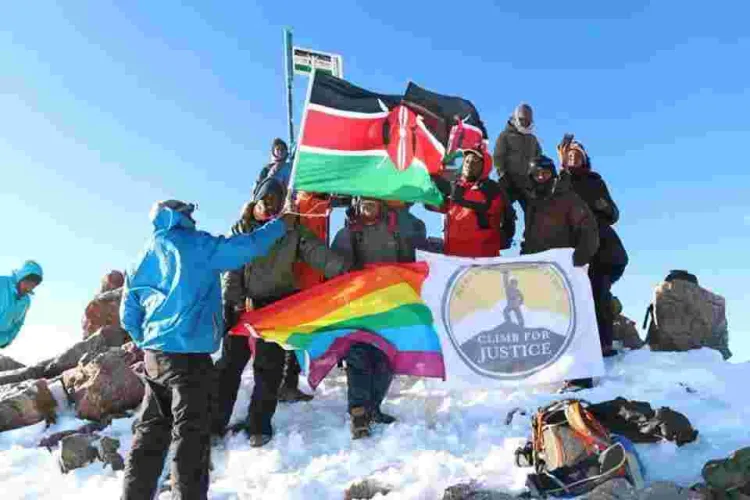 Members of Kenyan Gay Community Hoist Rainbow Flag at the Peak of Mt Kenya