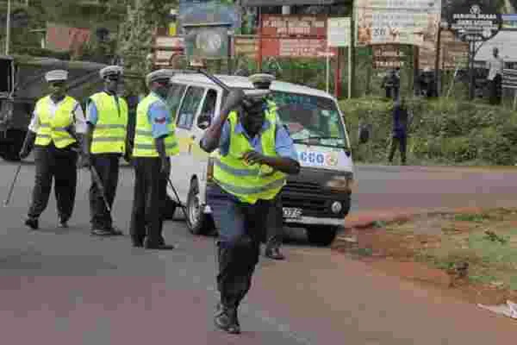 Daring Kenyan Man Snatches Bribe Money from Traffic Cops Along Busy Highway, Escapes into the Bush