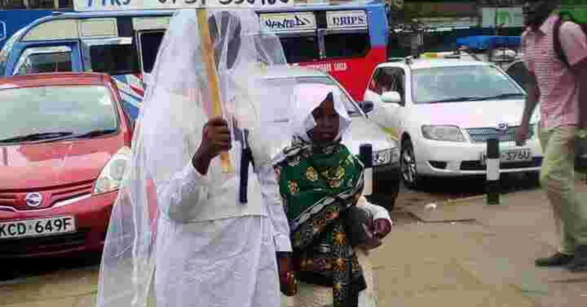 Woman Carries Placard in Streets of Nairobi in Search of Husband