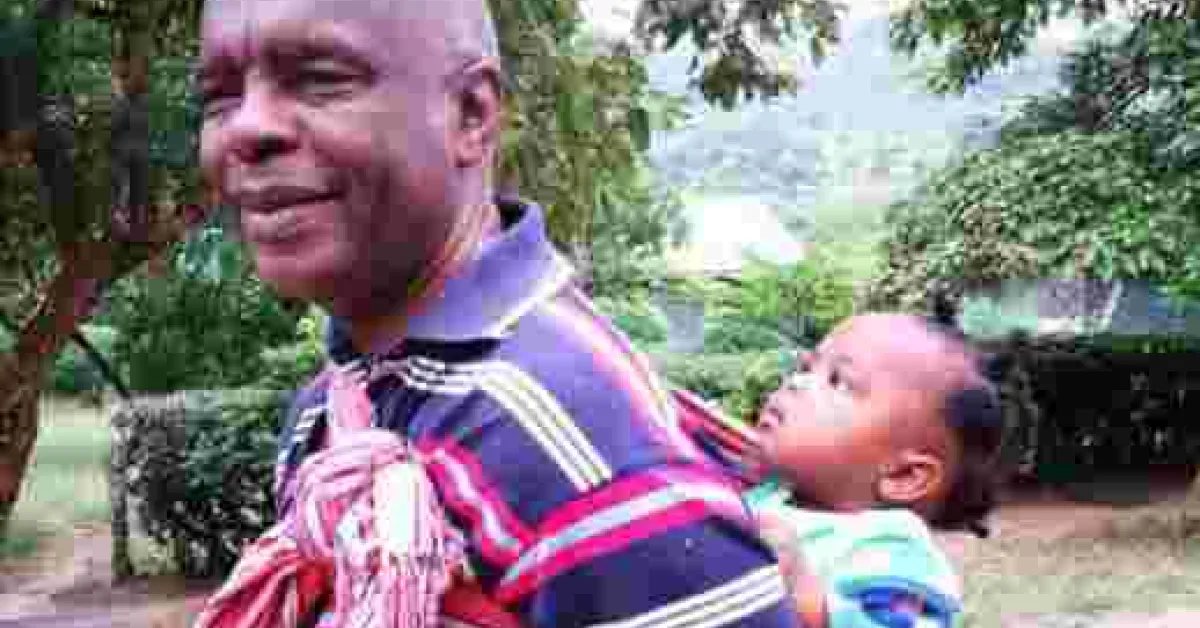 Photo of Makueni Governor Prof Kivutha Kibwana Carrying Child on His Back Goes Viral Online