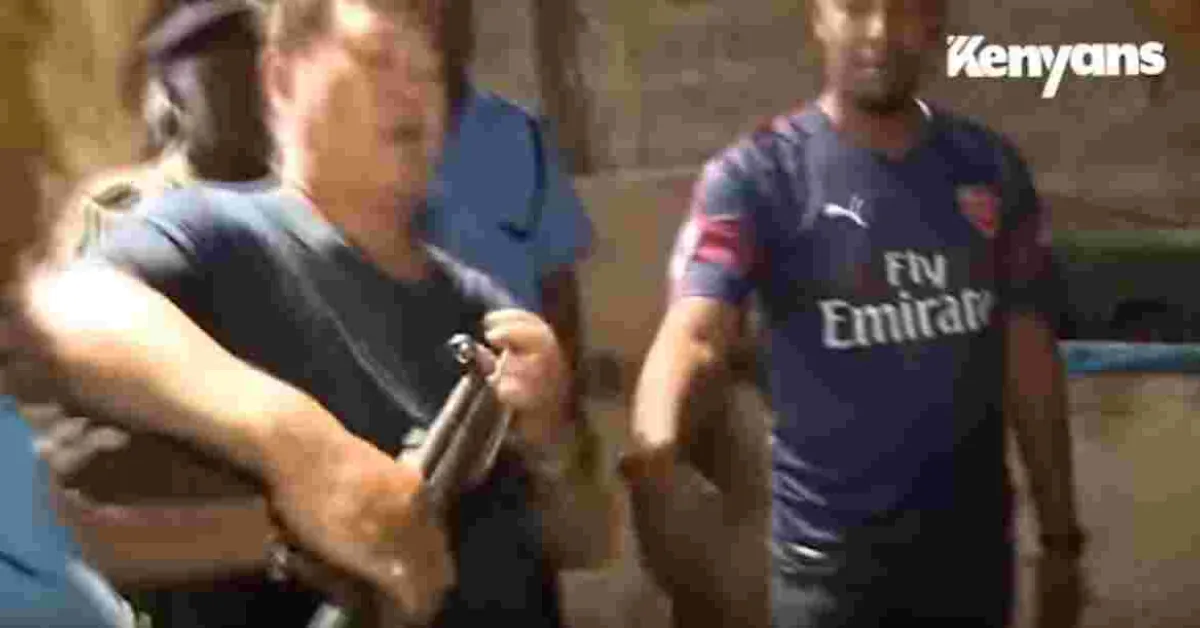 Chinese Man Attempts to Grab Gun from Kenyan Policeman During Arrest [VIDEO]