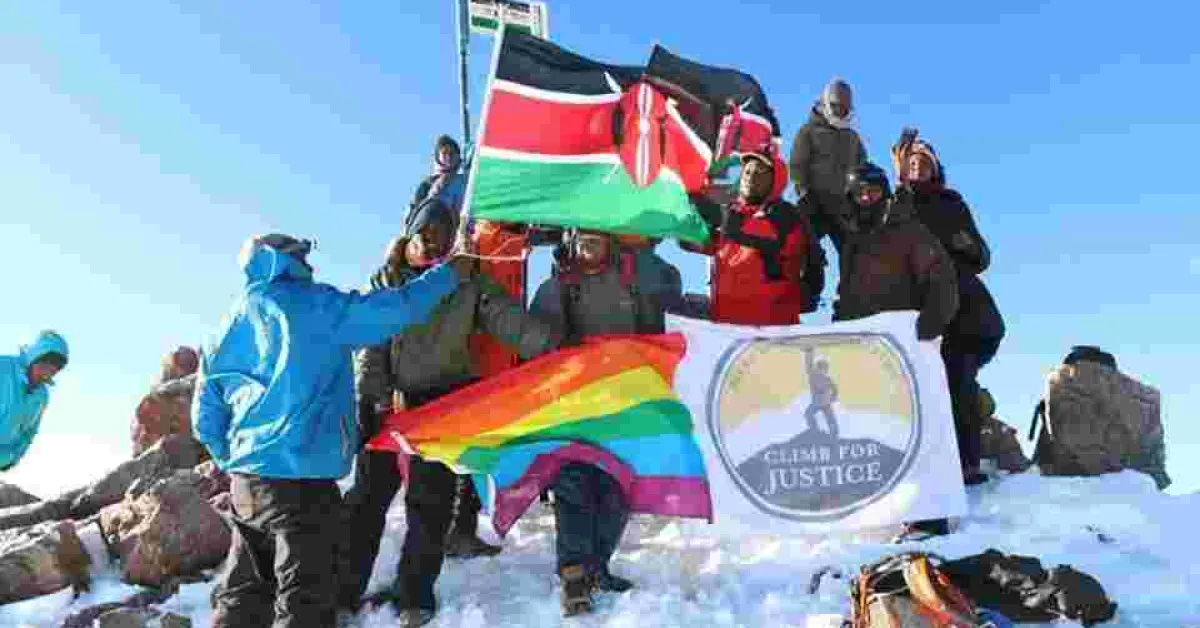 Members of Kenyan Gay Community Hoist Rainbow Flag at the Peak of Mt Kenya