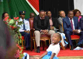 Kenya's First Female Aide-de-Camp RN Kamui Accompanies President Uhuru to a Public Event