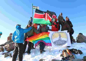 Members of Kenyan Gay Community Hoist Rainbow Flag at the Peak of Mt Kenya