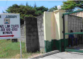 Woman Caught on CCTV Sprinkling White Powder Outside Magistrate's Office in Mombasa 