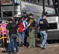US Immigration Officials Arrest 680 Immigrants in Largest Workplace Raids in a Decade
