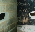 11 Prisoners Escape from Police Cell After Drilling Through Wall