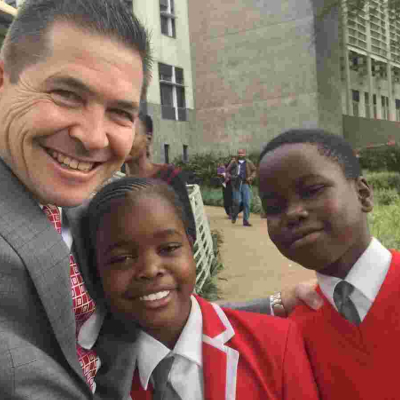 Kenyans Online Slam Ambassador Kyle McCarter for Taking Photo with Kids Who were Denied US Visas
