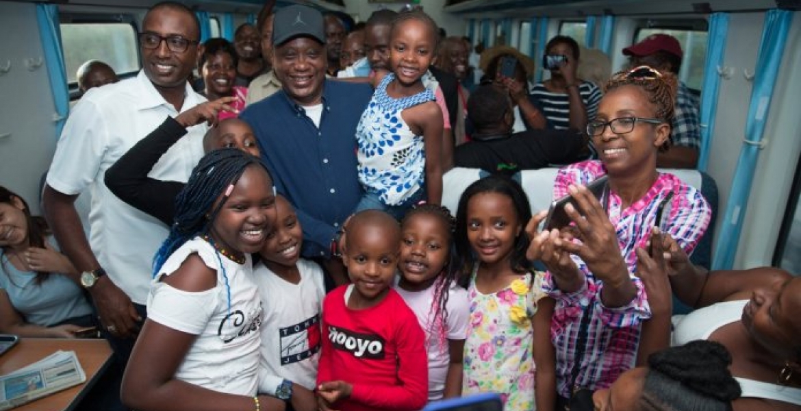 President Kenyatta Surprises Commuters As He Boards SGR Passenger Train Madaraka Express to Mombasa