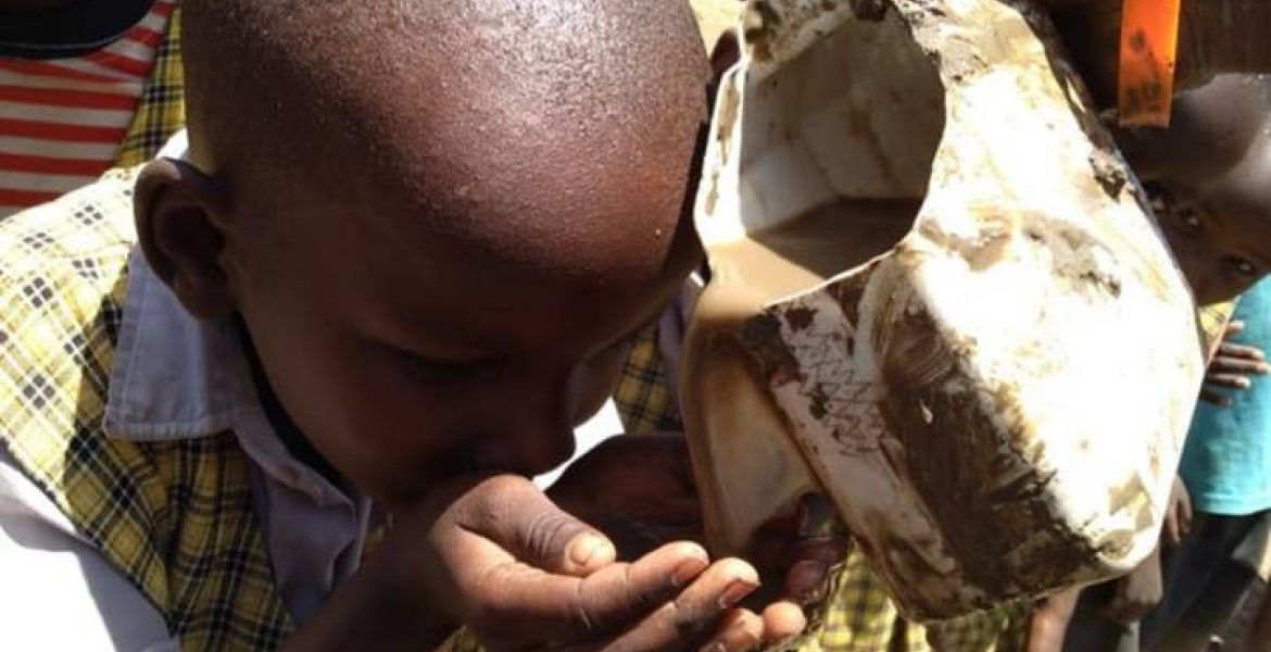 kids drinking dirty water