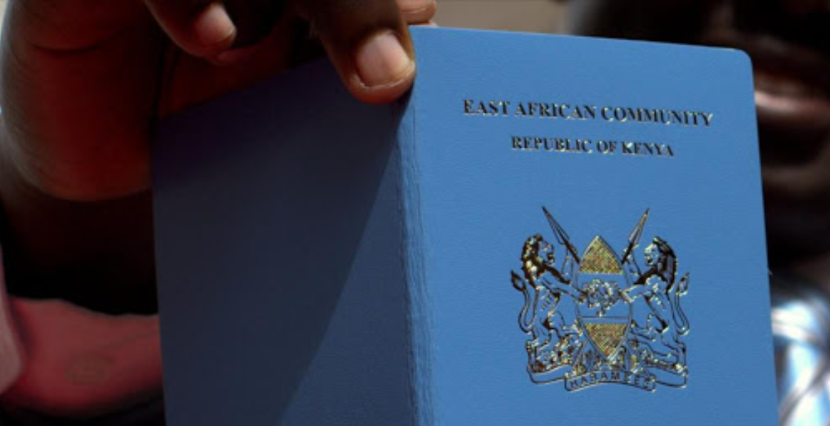 An Immigration Staffer Holds an e-passport at Nyayo House Kindiki Vows to Clear Passport Backlog in 21 Days