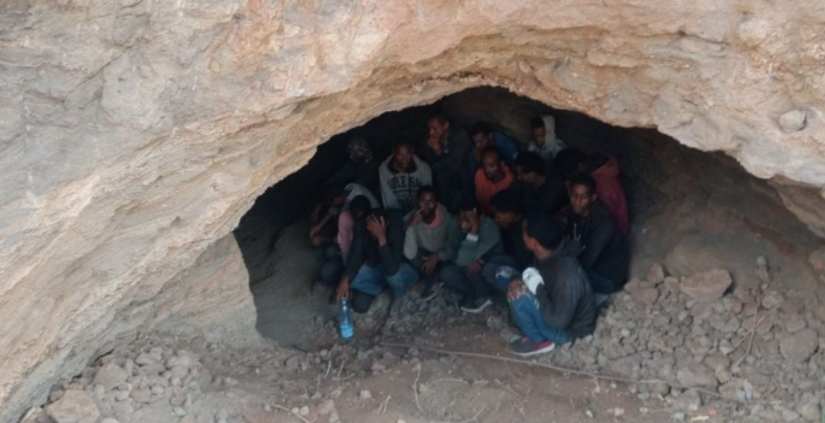 Some of the Ethiopian Illegal Immigrants Who Were Caught While Hiding in a Cave in Loitoktok Kenyan Police Thwart Human Trafficking Operation, Apprehend 90 Ethiopian Migrants
